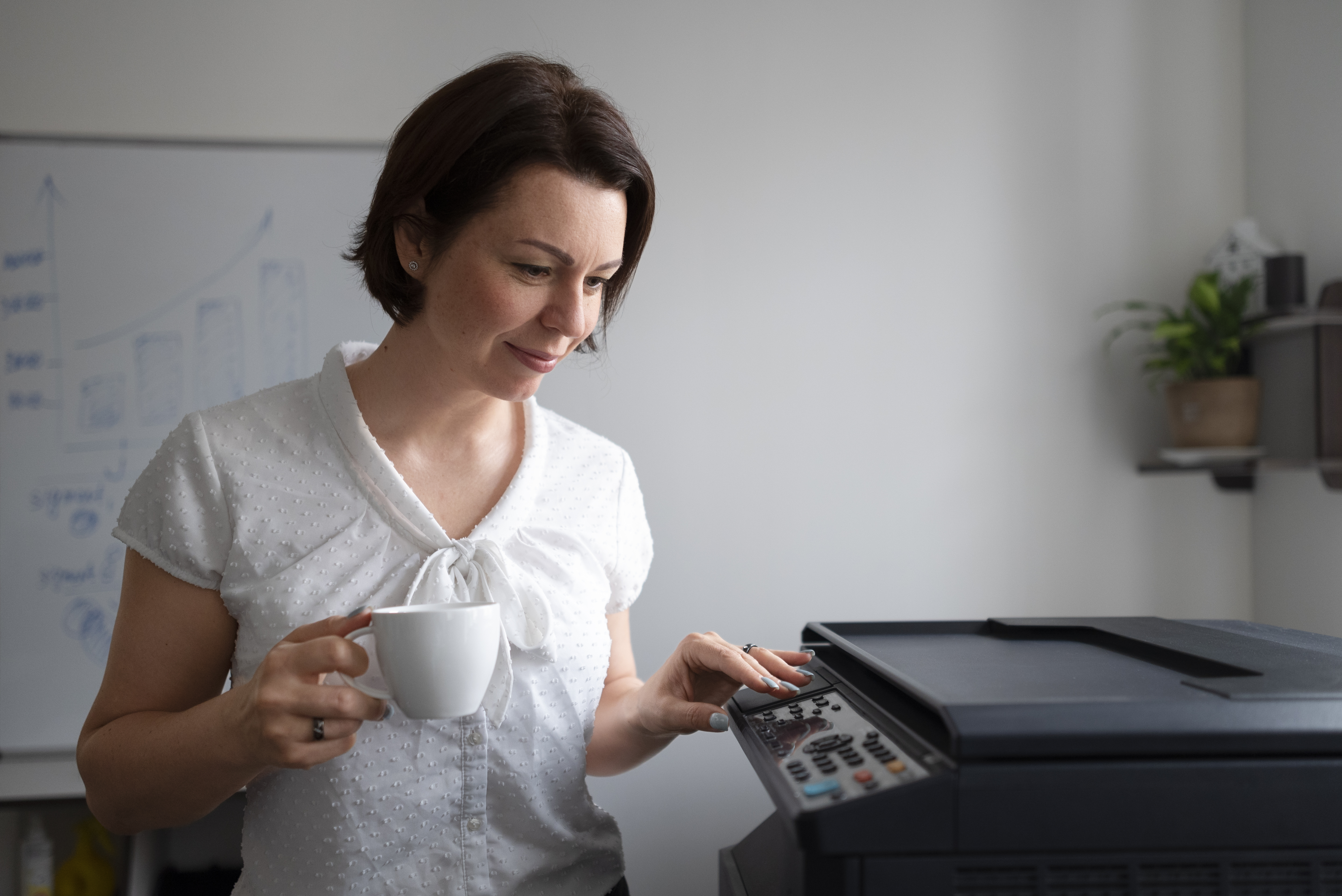 woman-working-office-using-printer
